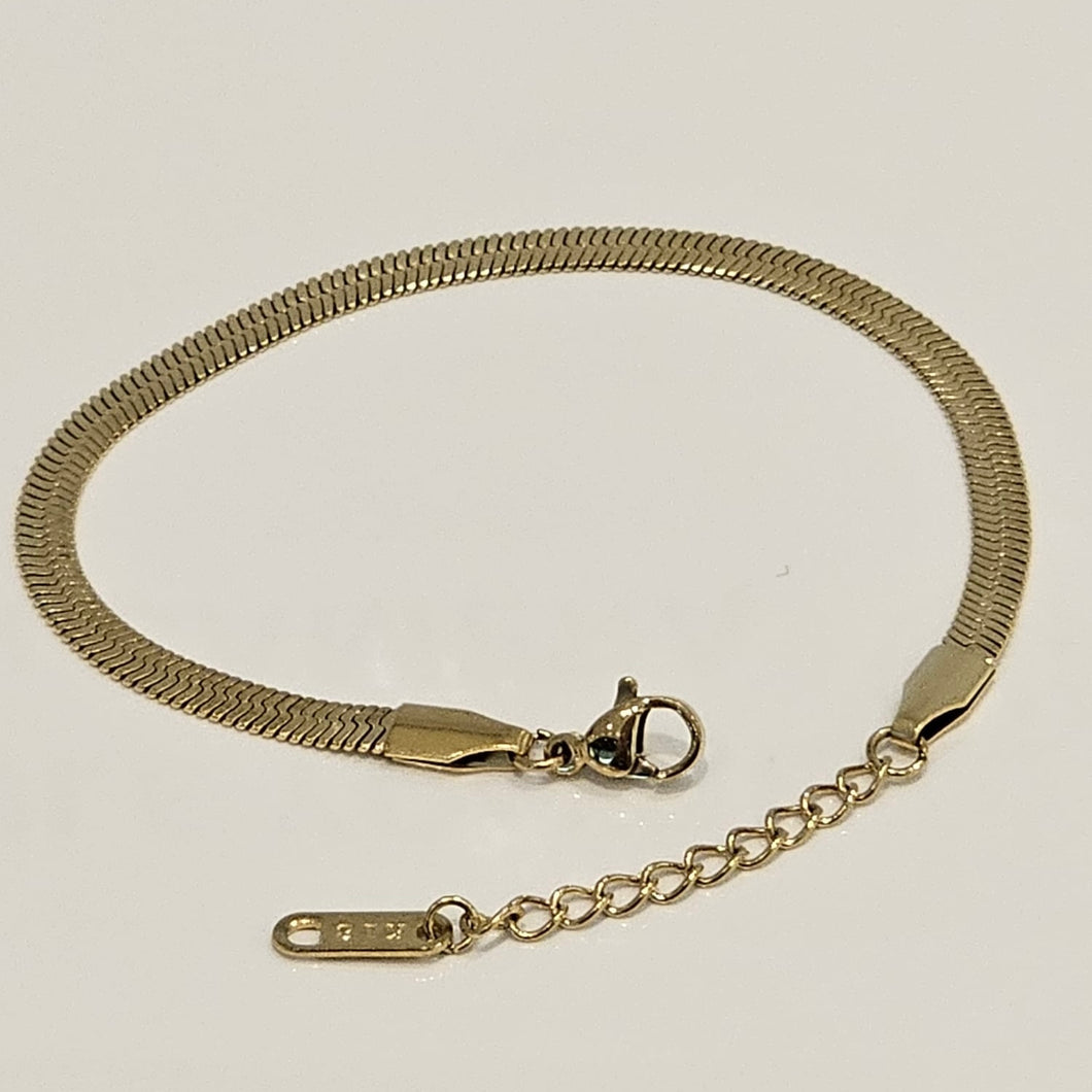 Gold herringbone bracelet